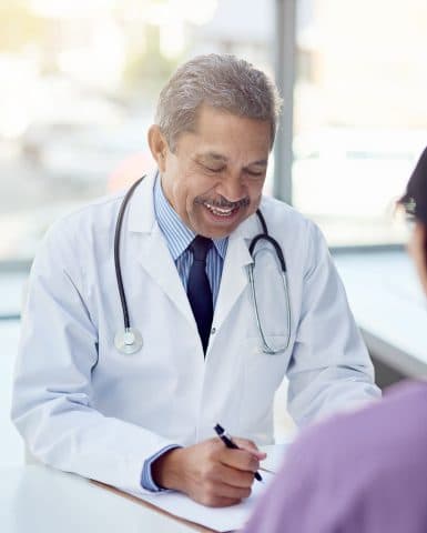 Licensed medical professional reviewing information